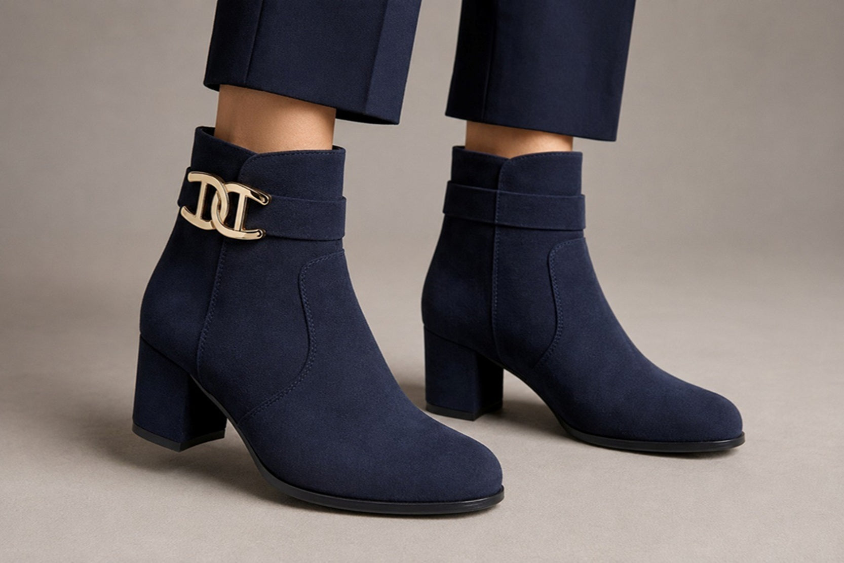 Elegant Ladies Heeled Boots with Gold Trim